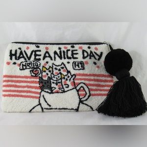 Clutch tapizada with Poms &tassels